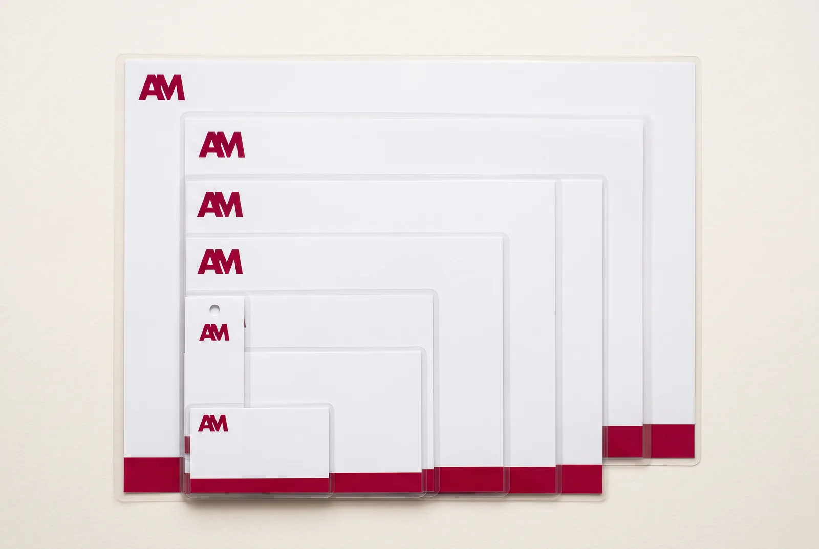 Laminated menu, index card, badge and tag showing available standard sizes
